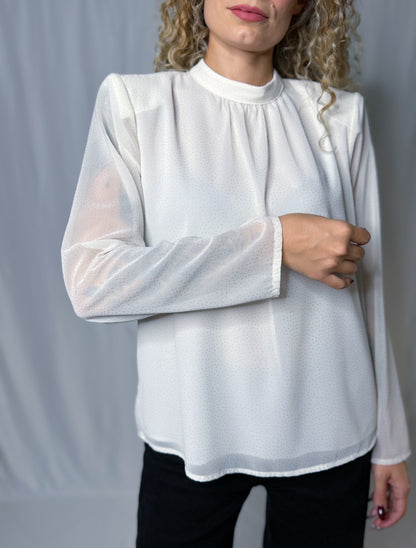 blusa bianca con micro strass oro